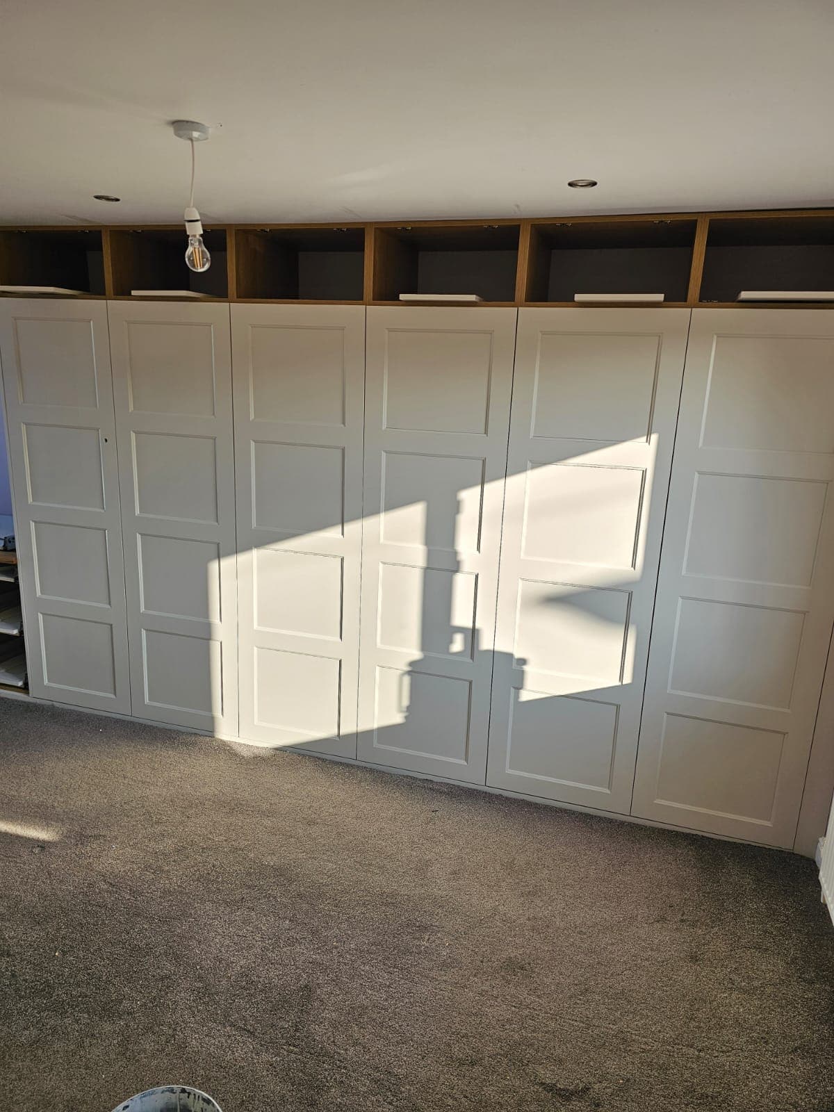 Bespoke Fitted Furniture — Full Wall — PHE Decorating Sheffield project photo