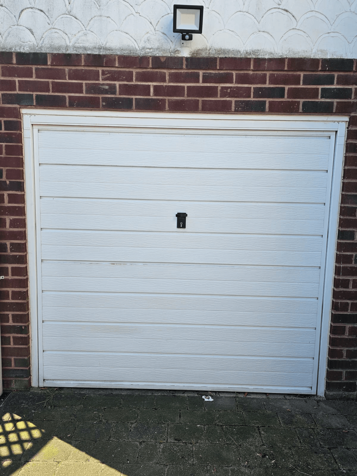 Garage door spraying Sheffield — bright white respray finished result