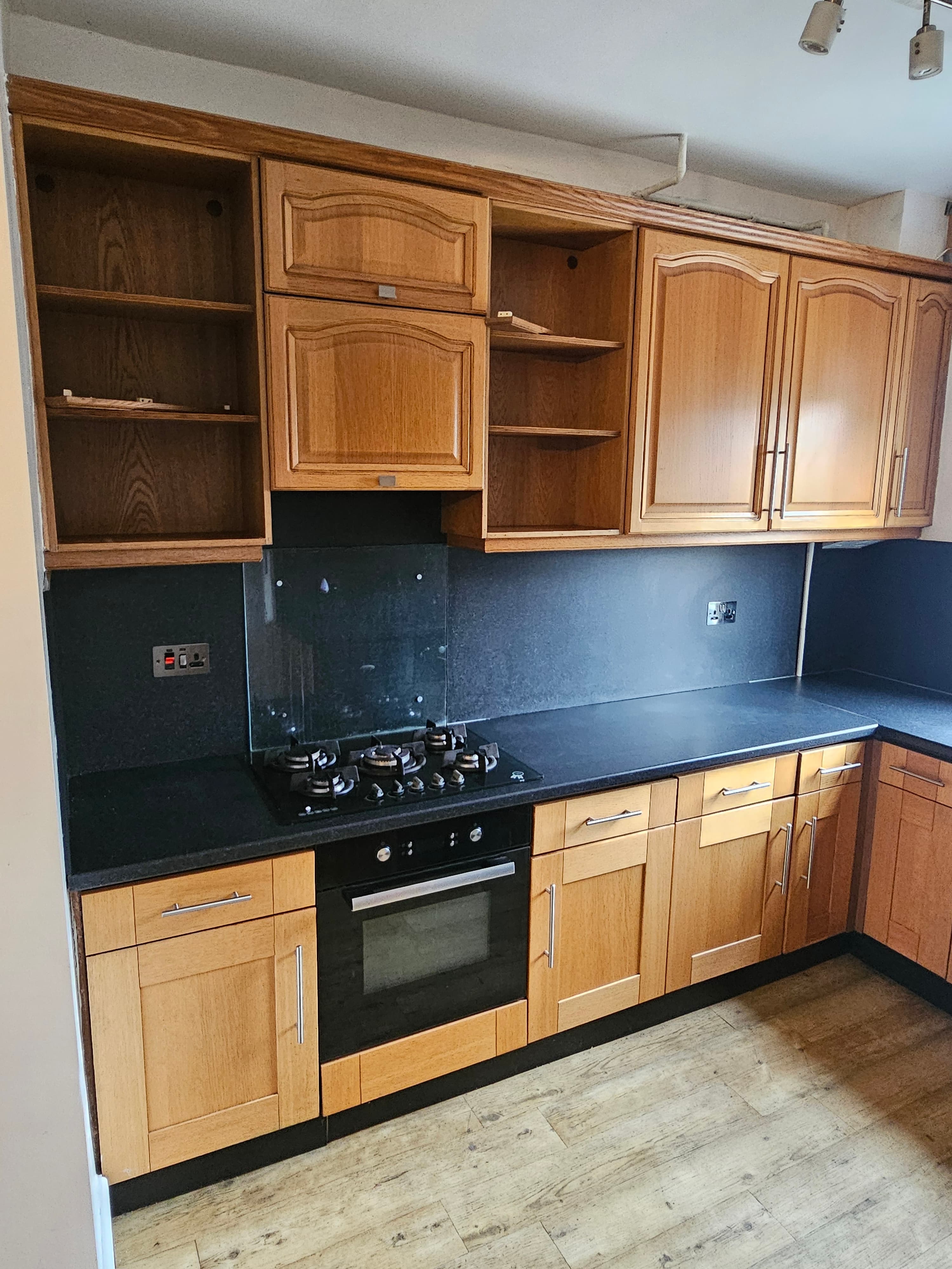 Kitchen before respray Sheffield — natural oak cabinets before colour change