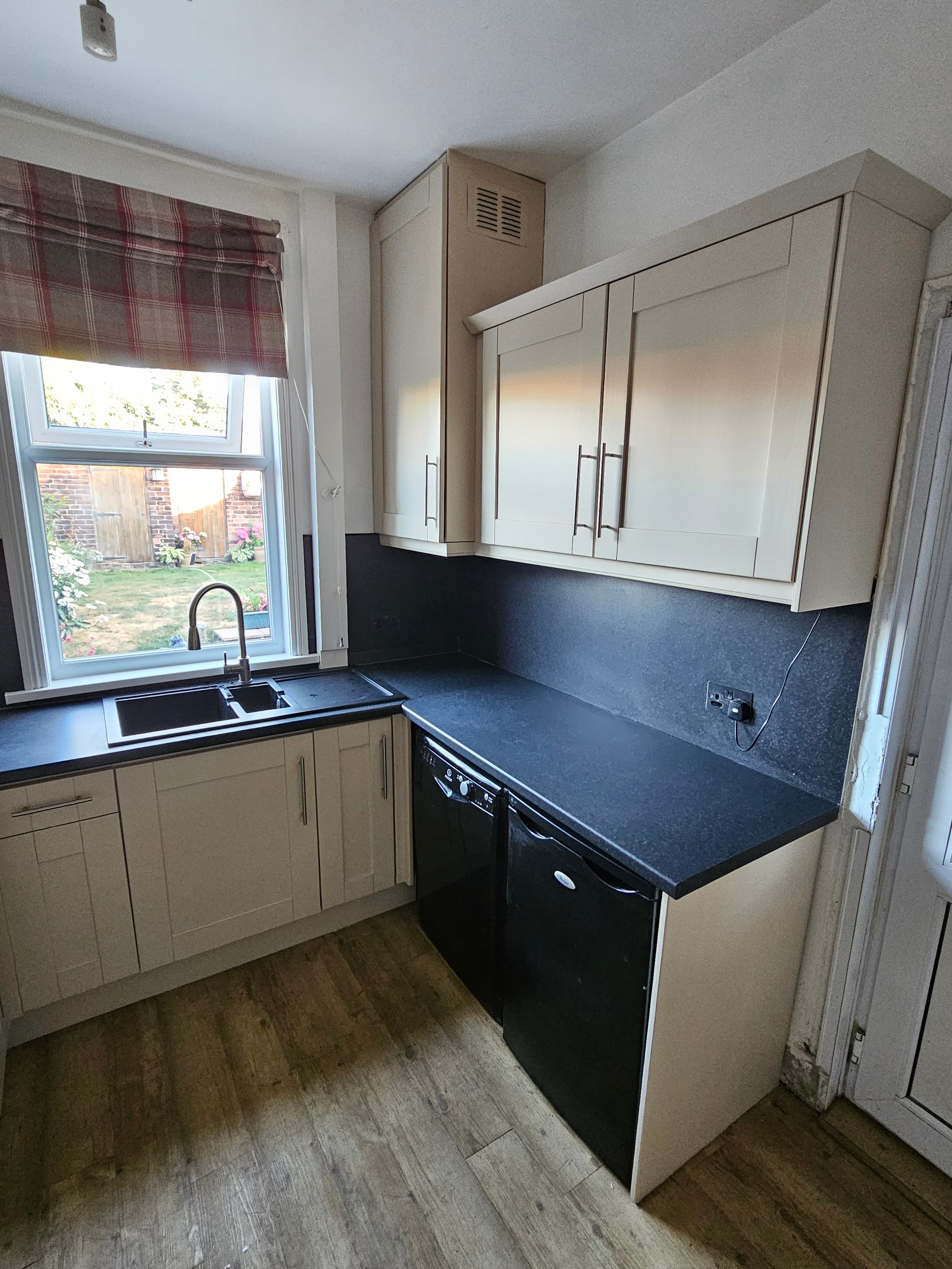 Kitchen respray Sheffield — completed cream kitchen detail with furniture