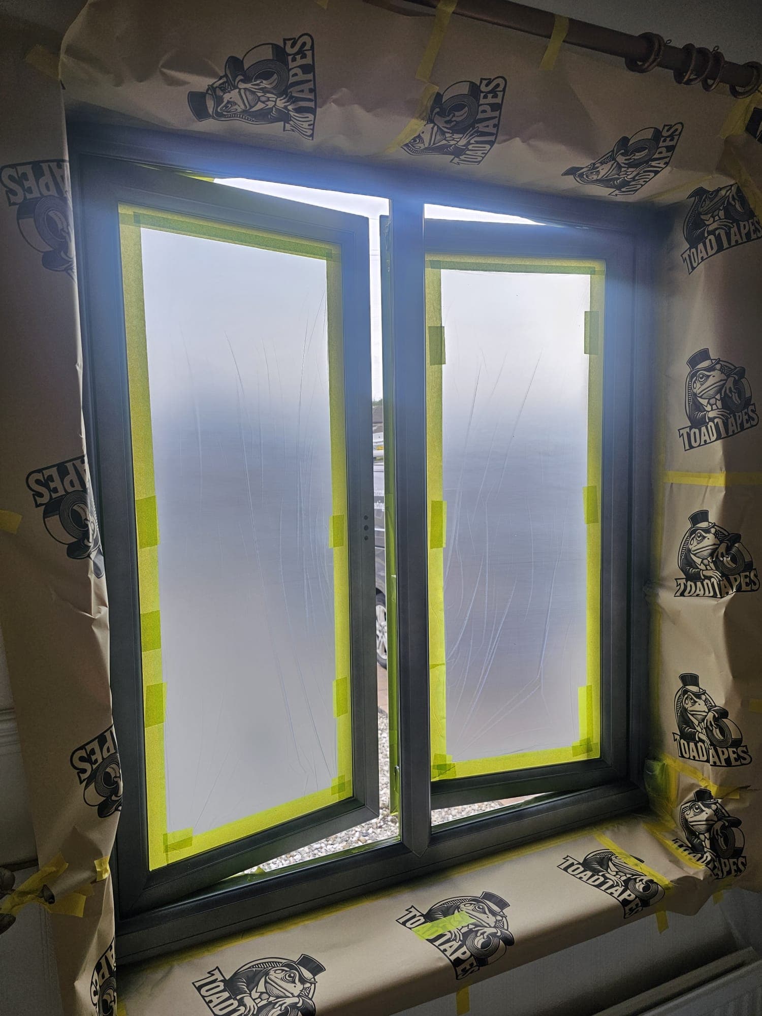 Client-supplied view 25 of recent UPVC window spraying work by PHE Decorating