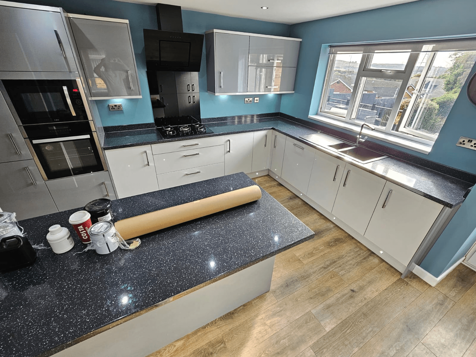 Kitchen worktop spraying Sheffield — black galaxy granite wide kitchen view