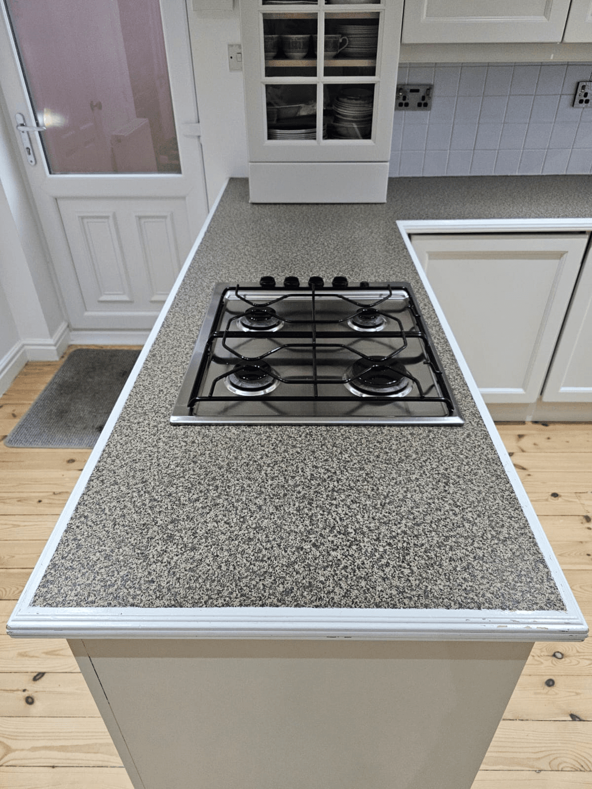 Kitchen worktop spraying Sheffield — granite resin finish on island