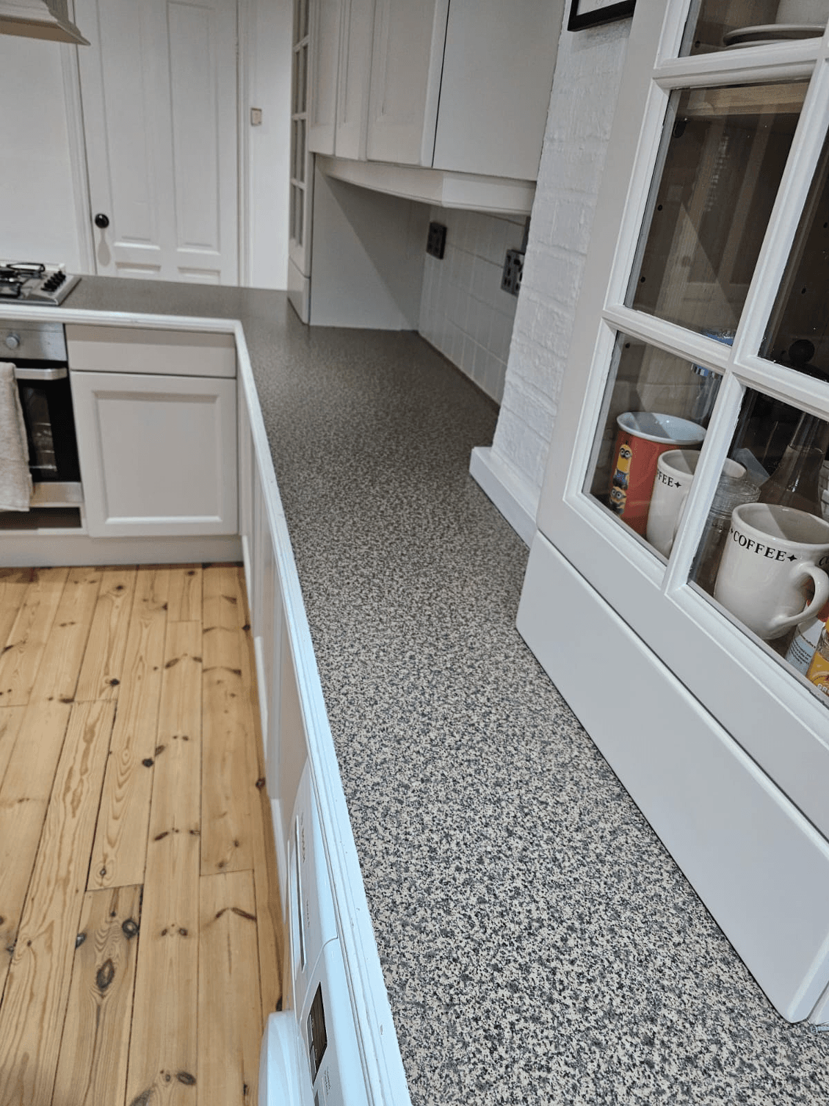Kitchen worktop spraying Sheffield — long granite resin worktop run